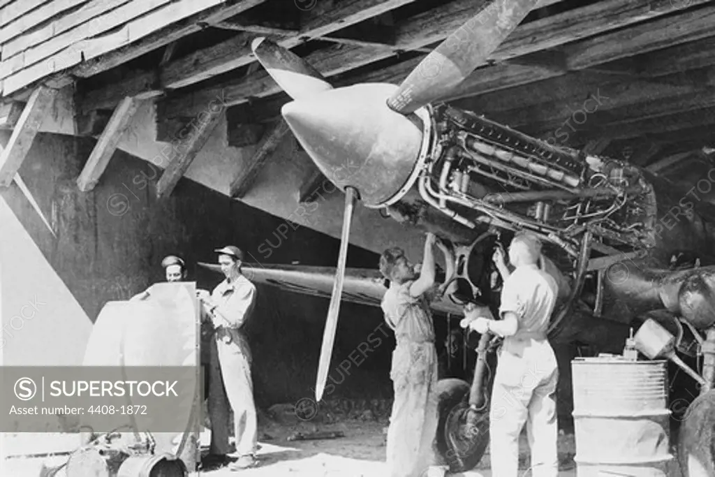 Ground crews of American Air Forces keep the engines tuned up for the Flying Tigers., Aviation