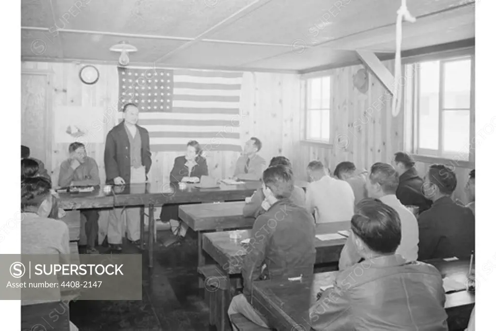 Roy Takano i.e., Takeno at town hall meeting, Manzanar Relocation Center, California, Ansel Adams
