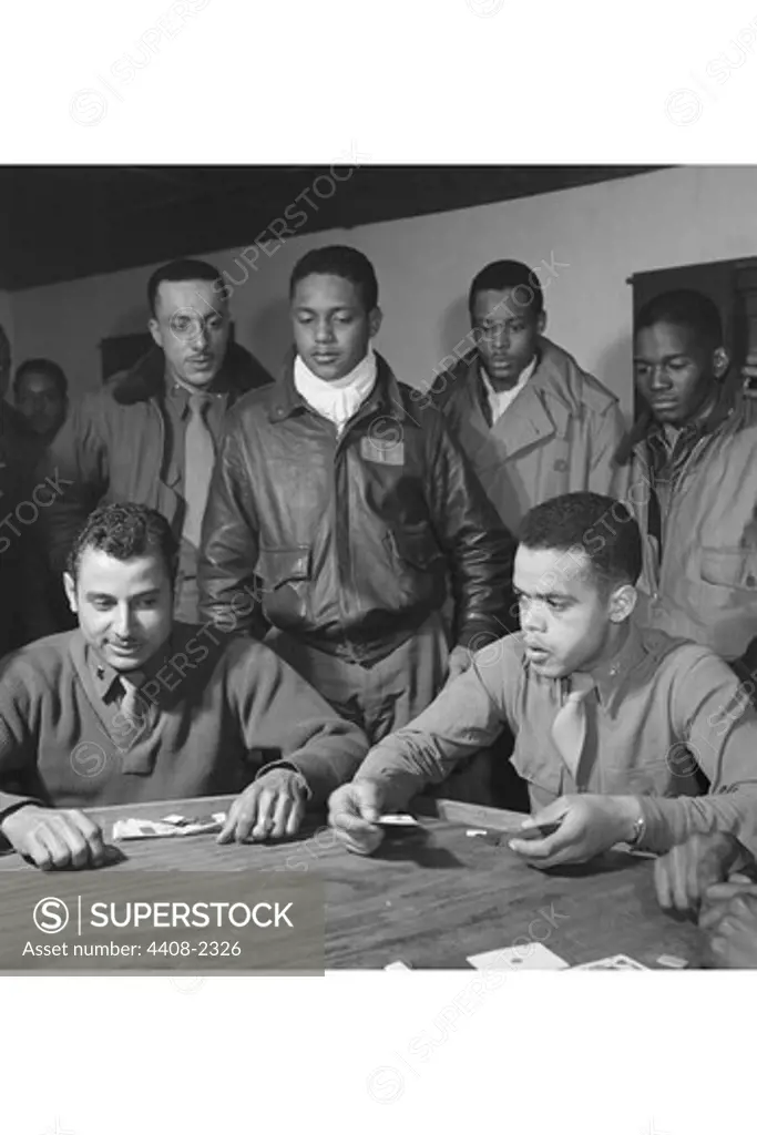 Tuskegee airmen playing cards in the officers' club in the evening, African-Americans