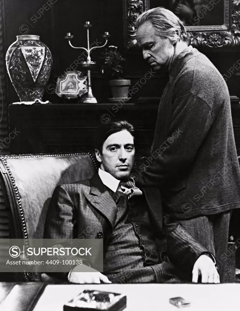 AL PACINO and MARLON BRANDO in THE GODFATHER (1972), directed by FRANCIS FORD COPPOLA.