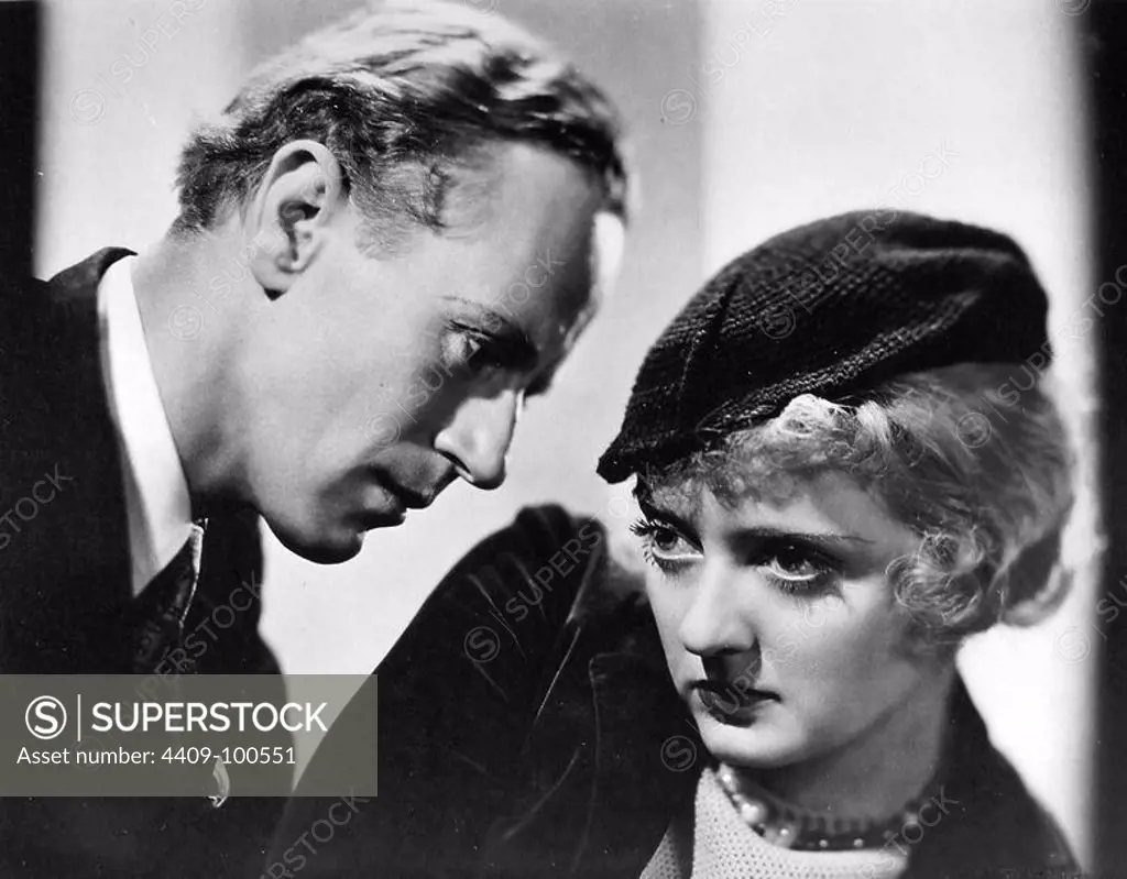 LESLIE HOWARD and BETTE DAVIS in OF HUMAN BONDAGE (1934), directed by JOHN CROMWELL.