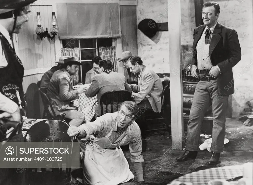JOHN WAYNE and JAMES STEWART in THE MAN WHO SHOT LIBERTY VALANCE (1962), directed by JOHN FORD.