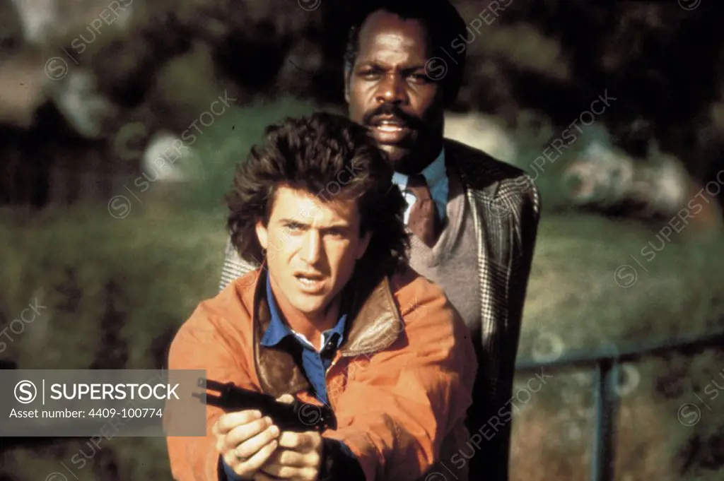 DANNY GLOVER and MEL GIBSON in LETHAL WEAPON (1987), directed by RICHARD DONNER.
