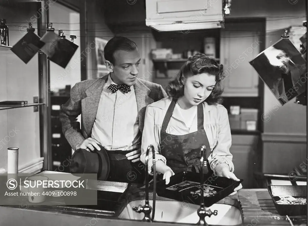 FRED ASTAIRE and JOAN LESLIE in THE SKY'S THE LIMIT (1943), directed by EDWARD H. GRIFFITH.