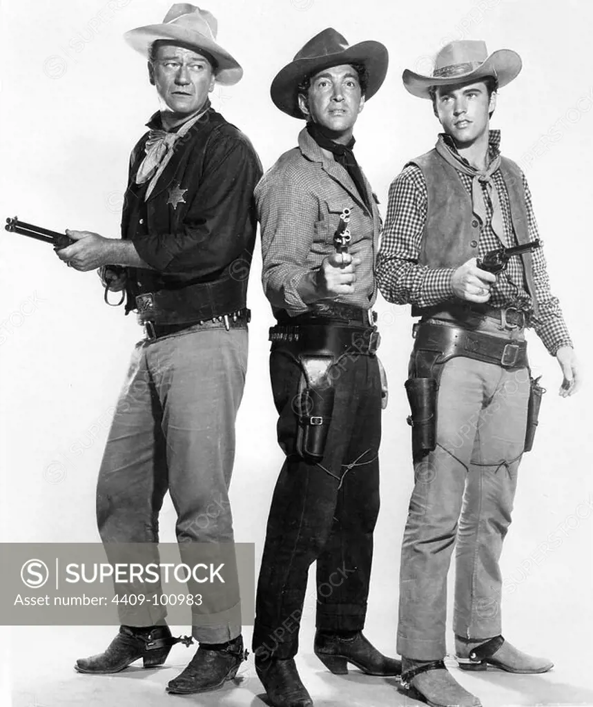 JOHN WAYNE, DEAN MARTIN and RICK NELSON (RICKY) in RIO BRAVO (1959), directed by HOWARD HAWKS.