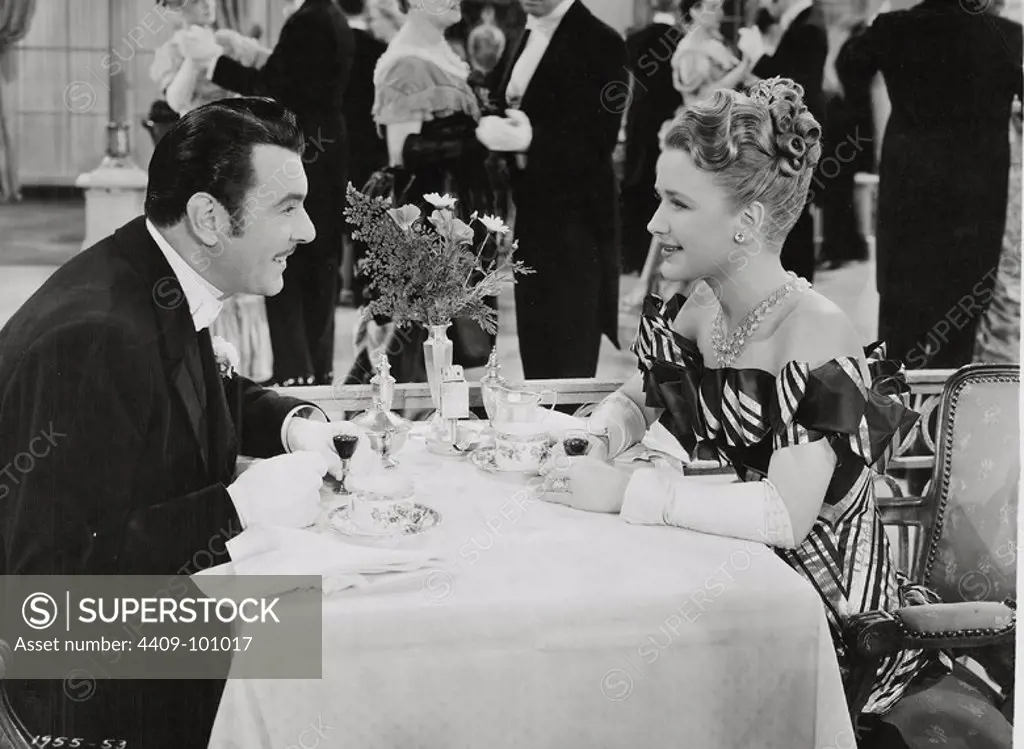 PRISCILLA LANE and GEORGE BRENT in SILVER QUEEN (1942), directed by LLOYD BACON.