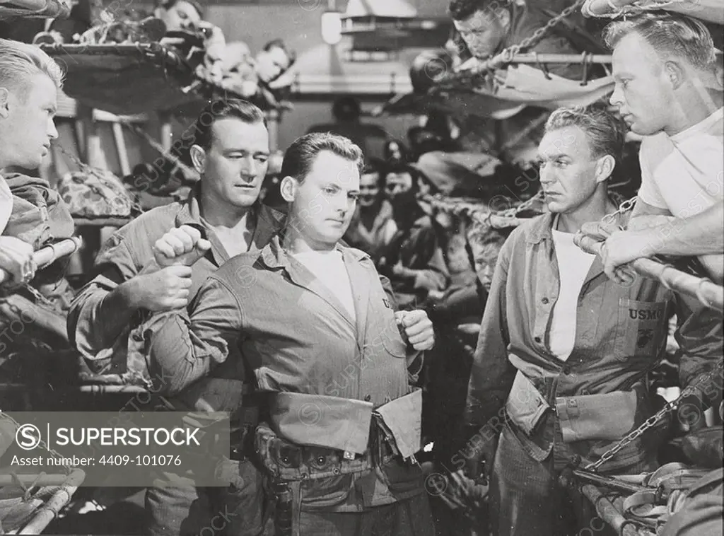 JOHN WAYNE and JOHN AGAR in SANDS OF IWO JIMA (1949), directed by ALLAN DWAN.