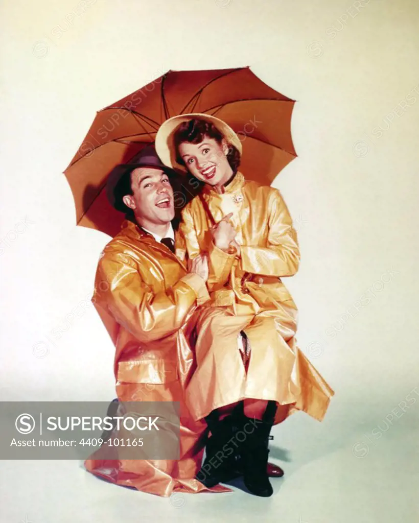 GENE KELLY and DEBBIE REYNOLDS in SINGIN' IN THE RAIN (1952), directed by GENE KELLY and STANLEY DONEN.