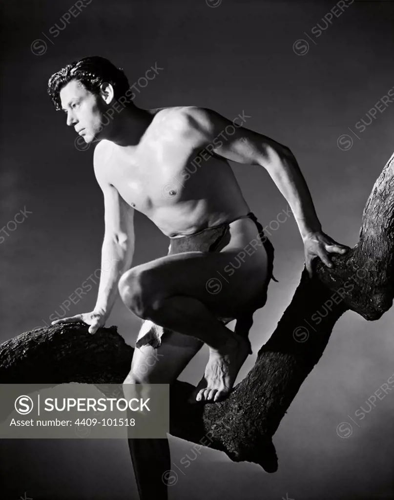 JOHNNY WEISSMULLER in TARZAN AND HIS MATE (1934), directed by CEDRIC GIBBONS.