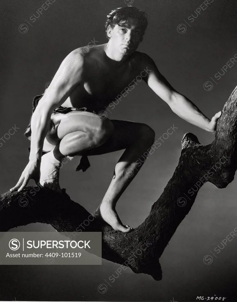 JOHNNY WEISSMULLER in TARZAN AND HIS MATE (1934), directed by CEDRIC GIBBONS.