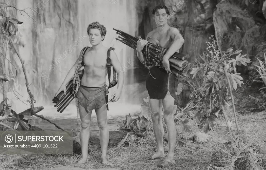 JOHNNY SHEFFIELD and JOHNNY WEISSMULLER in TARZAN AND THE HUNTRESS (1947), directed by KURT NEUMANN.