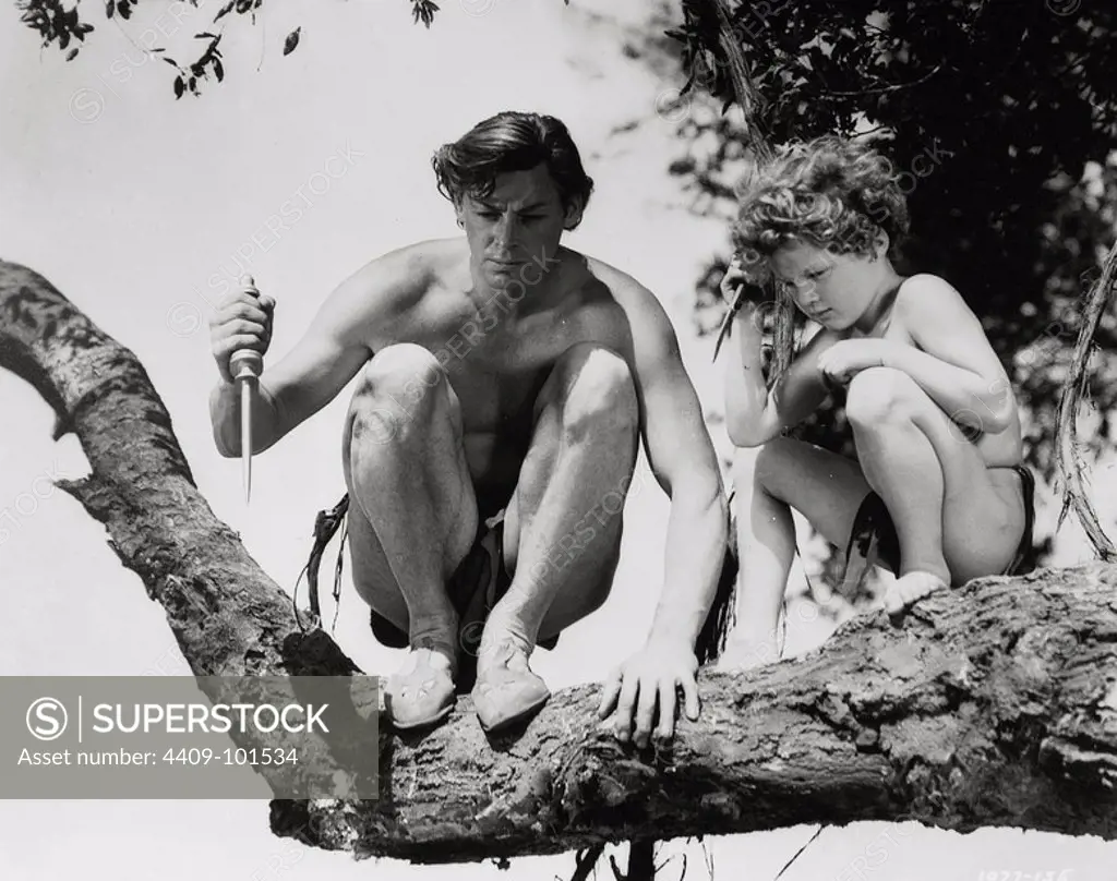 JOHNNY SHEFFIELD and JOHNNY WEISSMULLER in TARZAN FINDS A SON! (1939), directed by RICHARD THORPE.