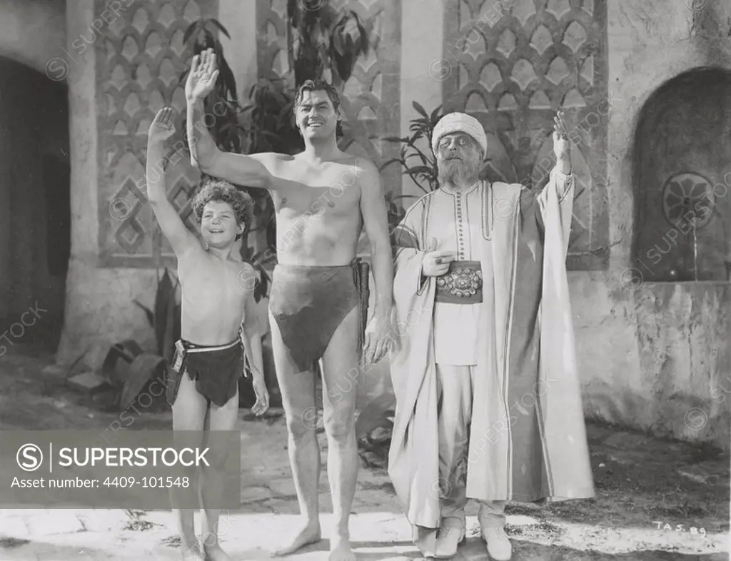 JOHNNY SHEFFIELD and JOHNNY WEISSMULLER in TARZAN'S DESERT MYSTERY (1943), directed by WILHELM THIELE.
