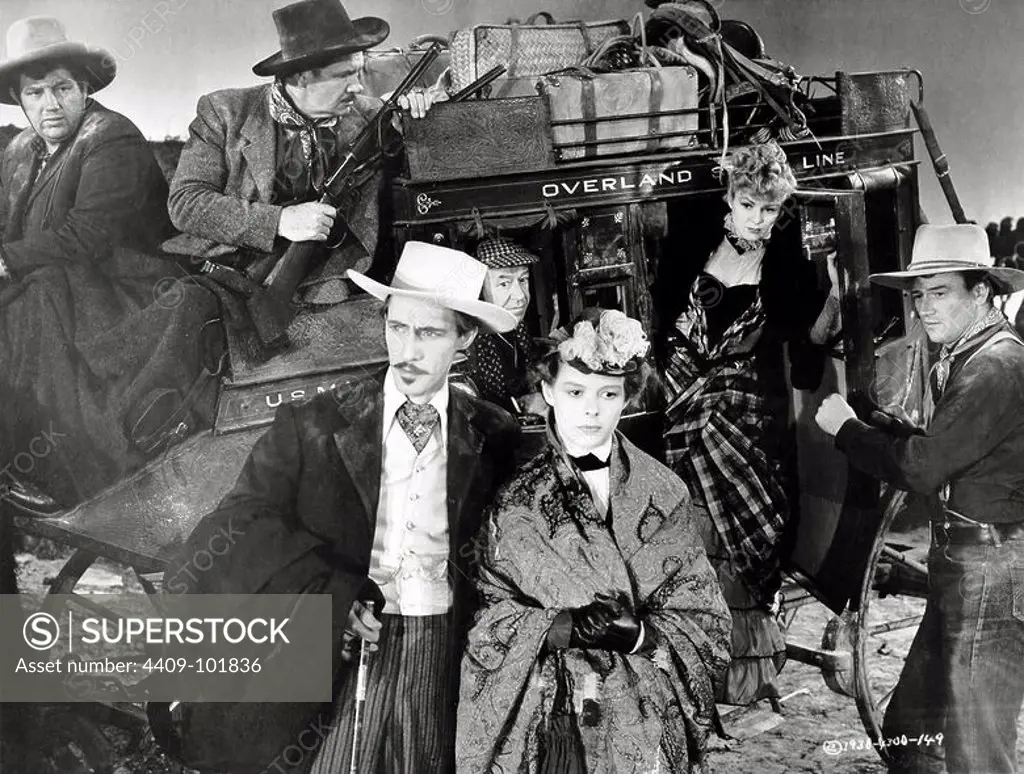 JOHN WAYNE, JOHN CARRADINE, ANDY DEVINE, GEORGE BANCROFT and LOUISE PLATT in STAGECOACH (1939), directed by JOHN FORD.