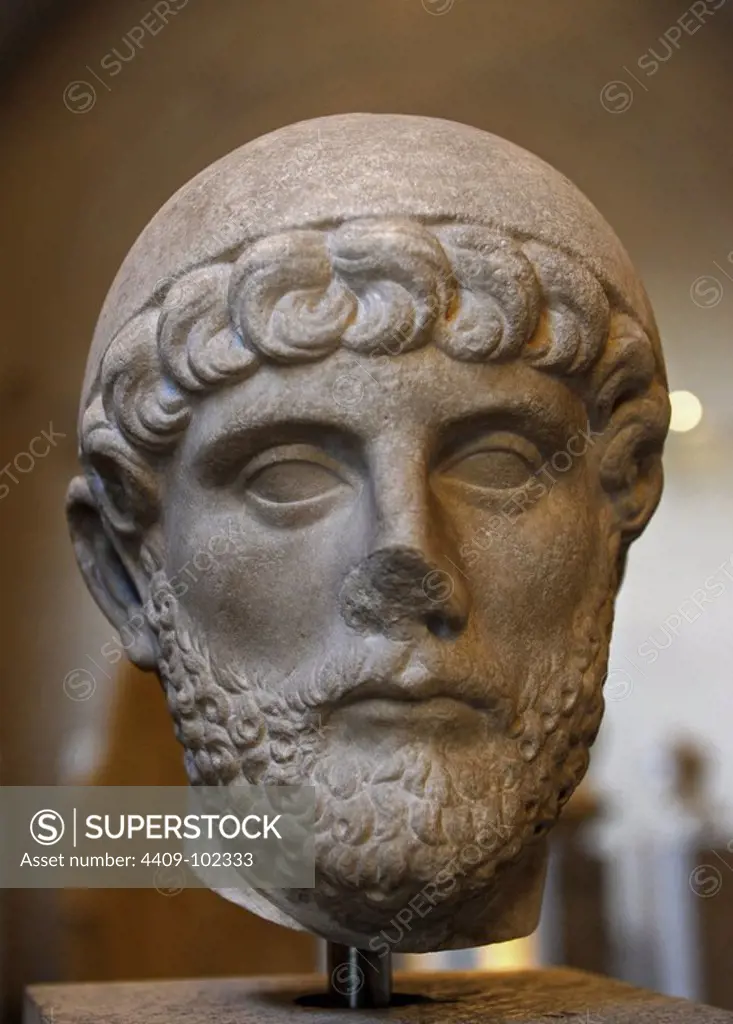 Roman art. Imperial era. Head of a man with a Priest's cap. About 120 AD.