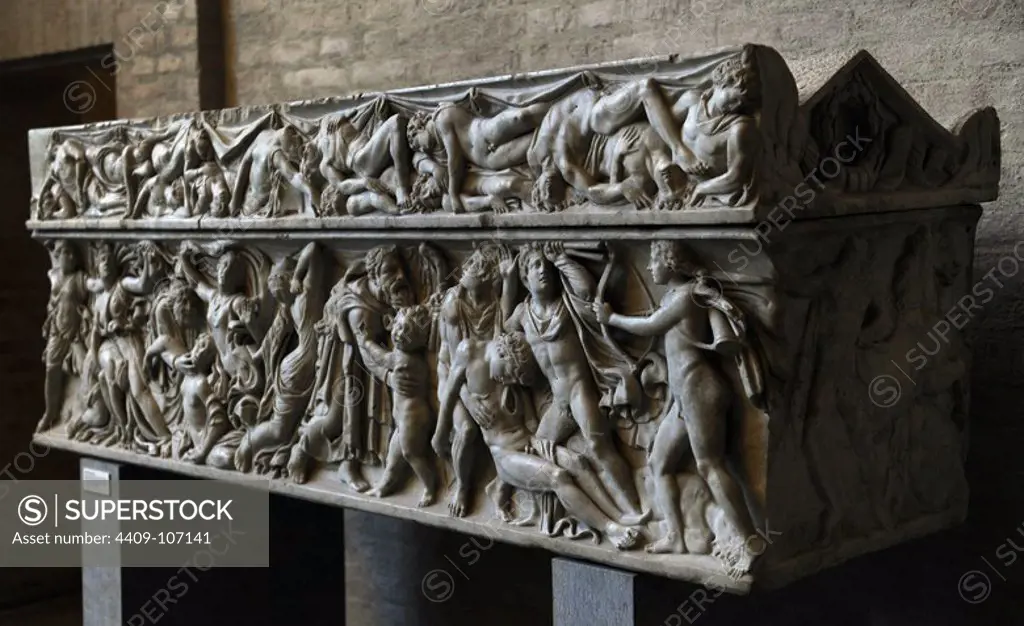 Roman sarcophagus. About 160 AD. Apollo and Artemis kill Niobe's 14 children. Revenge of Leto. Send your children Apollo and Artemis killing the children of Niobe. In the corner, a figure of Apollo with bow. Glyptothek. Munich. Germany.
