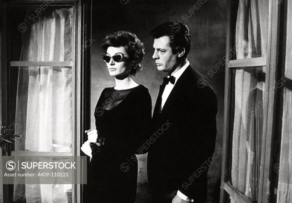 MARCELLO MASTROIANNI and ANOUK AIMEE in THE SWEET LIFE (1960) -Original title: LA DOLCE VITA-, directed by FEDERICO FELLINI.