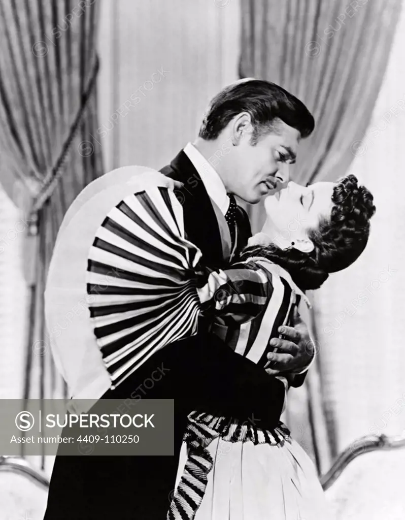 CLARK GABLE and VIVIEN LEIGH in GONE WITH THE WIND (1939), directed by GEORGE CUKOR and VICTOR FLEMING.
