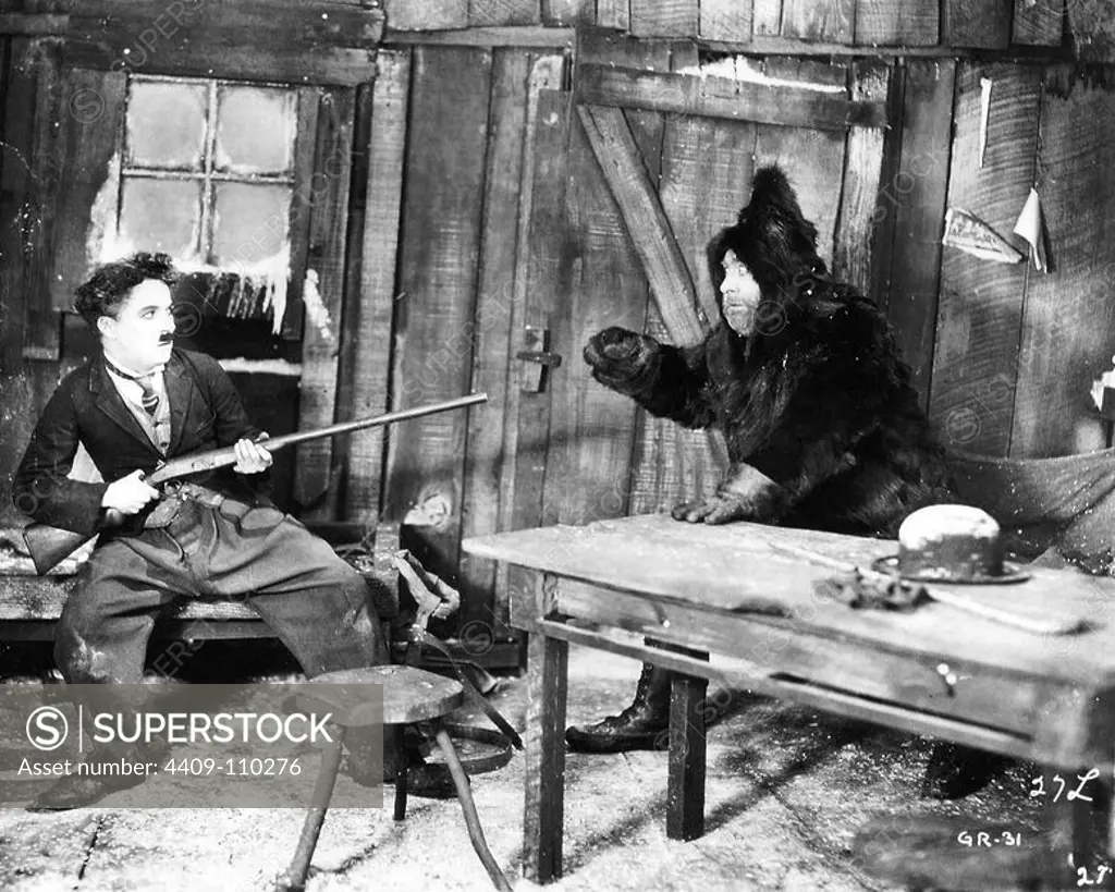 MACK SWAIN and CHARLIE CHAPLIN in THE GOLD RUSH (1925), directed by CHARLIE CHAPLIN.