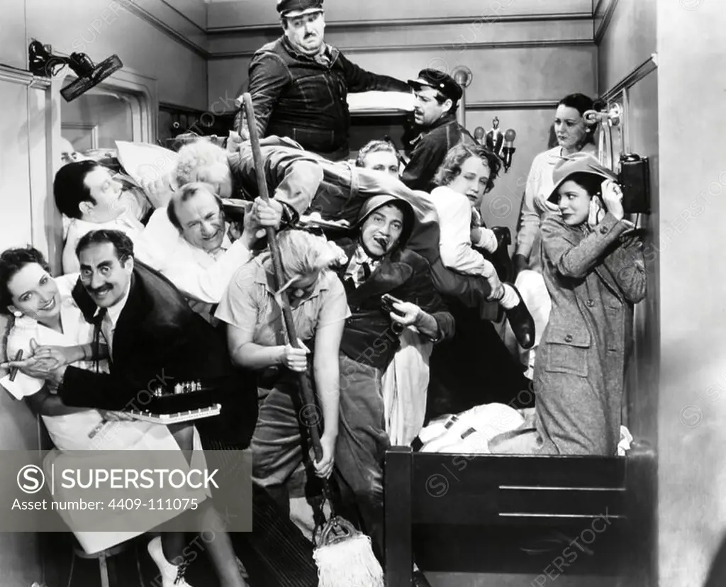 HARPO MARX, THE MARX BROTHERS, CHICO MARX and GROUCHO MARX in A NIGHT AT THE OPERA (1935), directed by SAM WOOD.