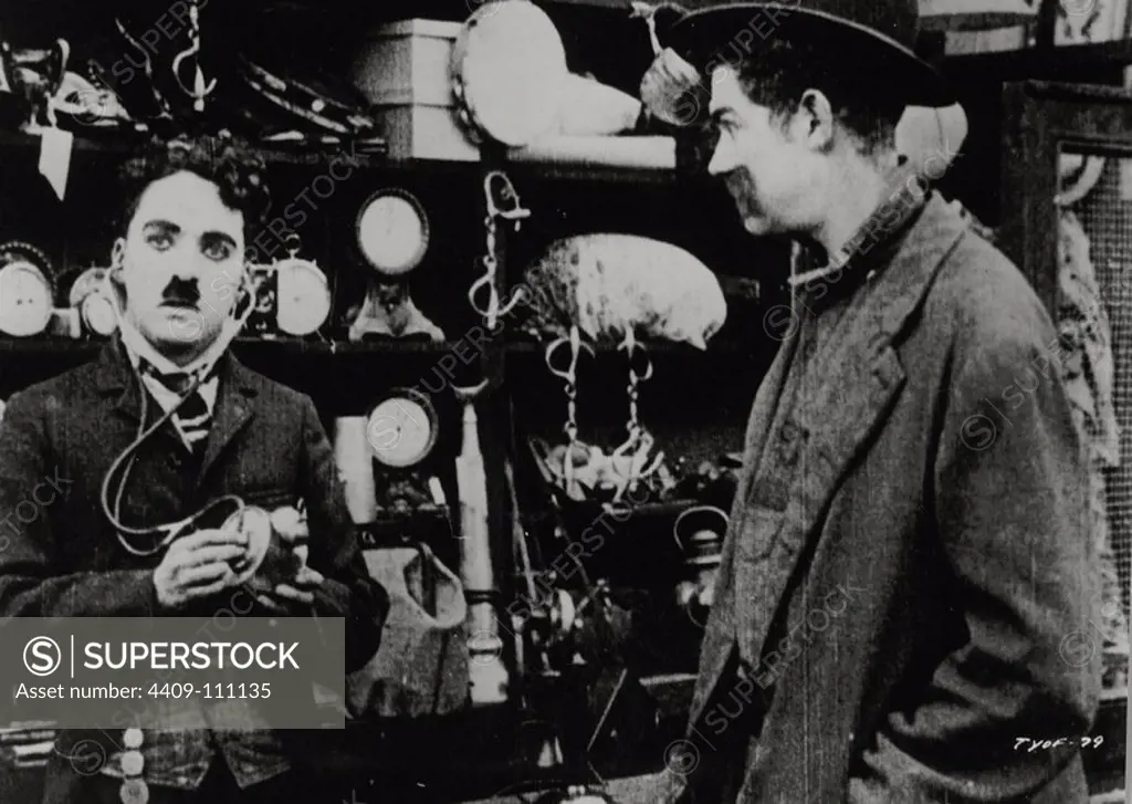 CHARLIE CHAPLIN in THE PAWNSHOP (1916), directed by CHARLIE CHAPLIN.
