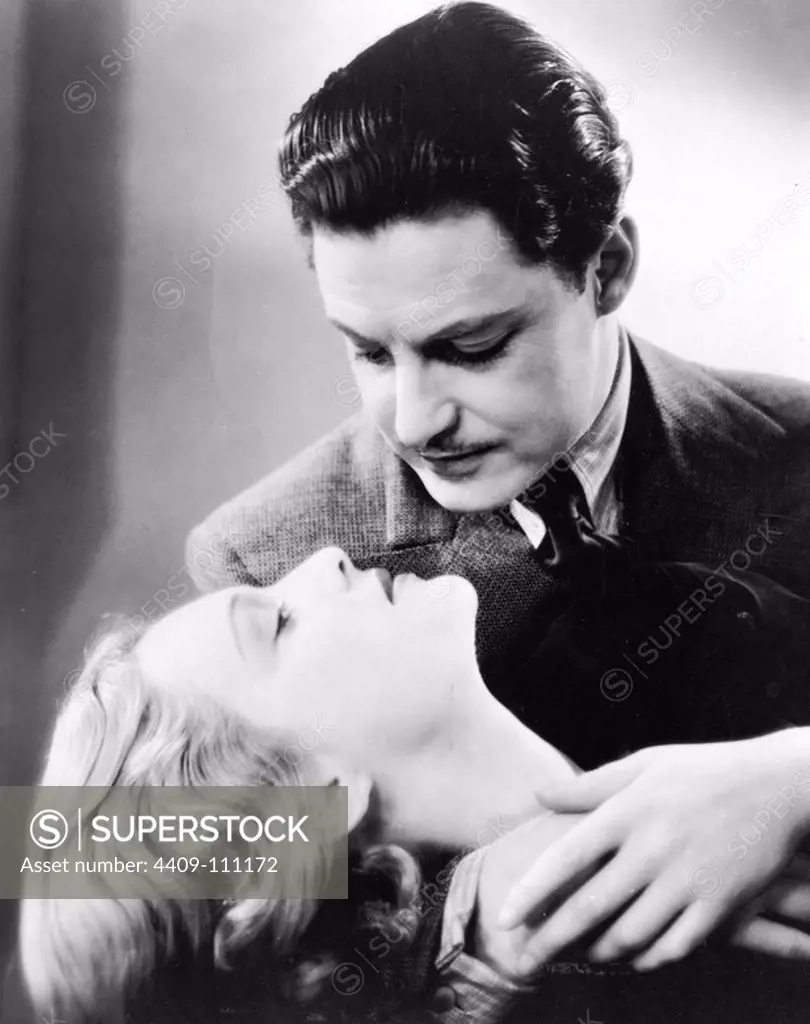 ROBERT DONAT and MADELEINE CARROLL in THE 39 STEPS (1935), directed by ALFRED HITCHCOCK.