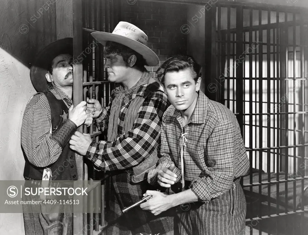 GLENN FORD and GUINN WILLIAMS in THE DESPERADOES (1943), directed by CHARLES VIDOR.