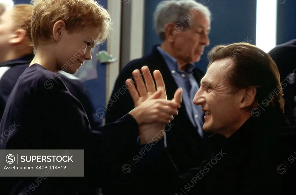 LIAM NEESON and THOMAS SANGSTER in LOVE ACTUALLY (2003), directed by RICHARD CURTIS.