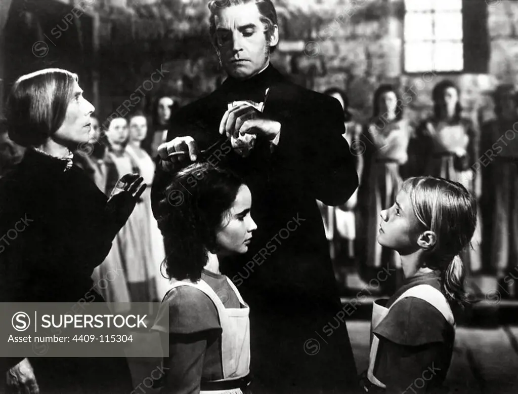 ELIZABETH TAYLOR, HENRY DANIELL and PEGGY ANN GARNER in JANE EYRE (1944), directed by ROBERT STEVENSON.