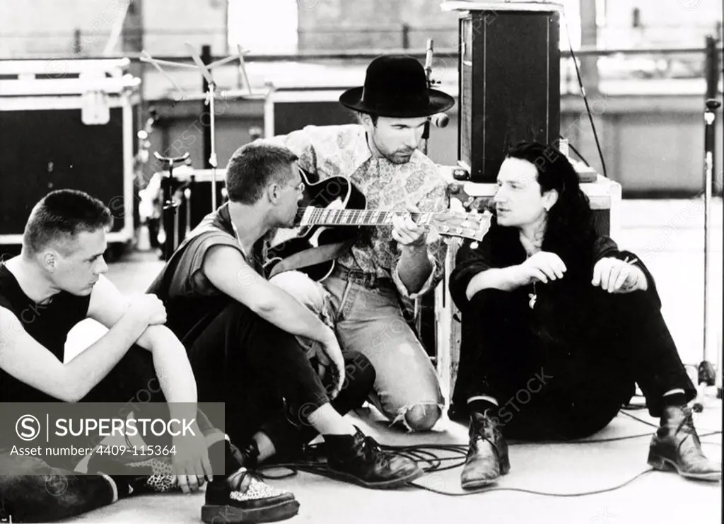 LARRY MULLEN, ADAM CLAYTON, BONO and THE EDGE in U2: RATTLE AND HUM (1988), directed by PHIL JOANOU.