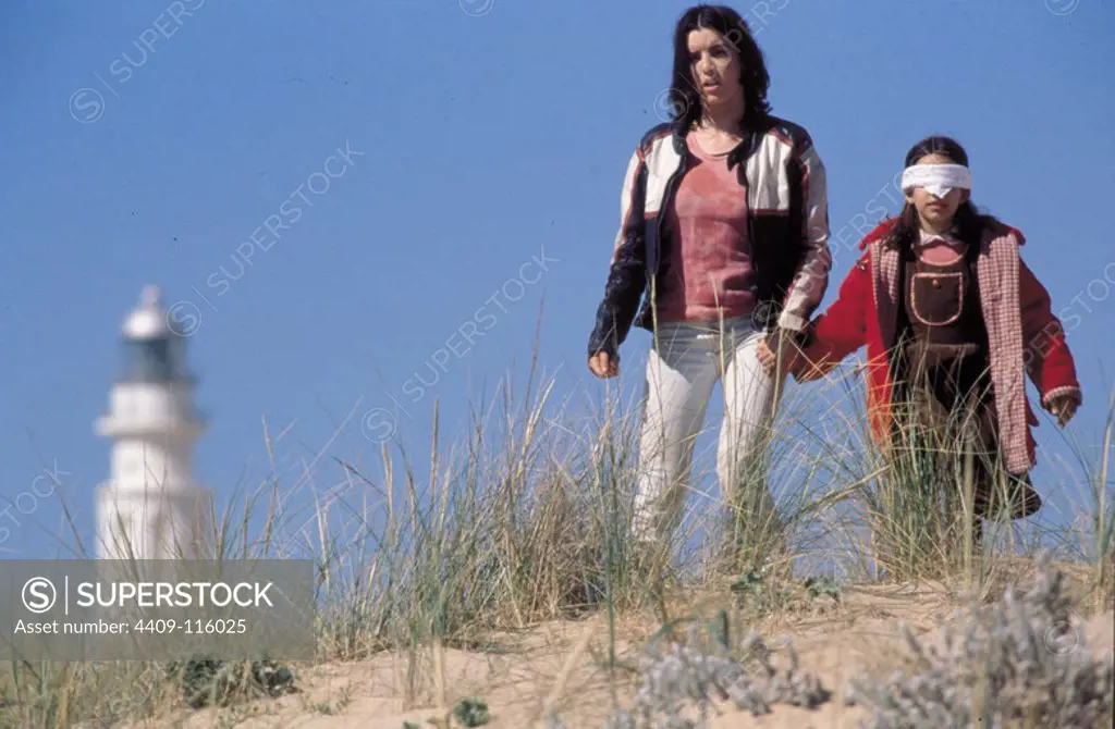 LAIA MARULL and BEATRIZ CORONEL in FUGITIVES (2000) -Original title: FUGITIVAS-, directed by MIGUEL HERMOSO.