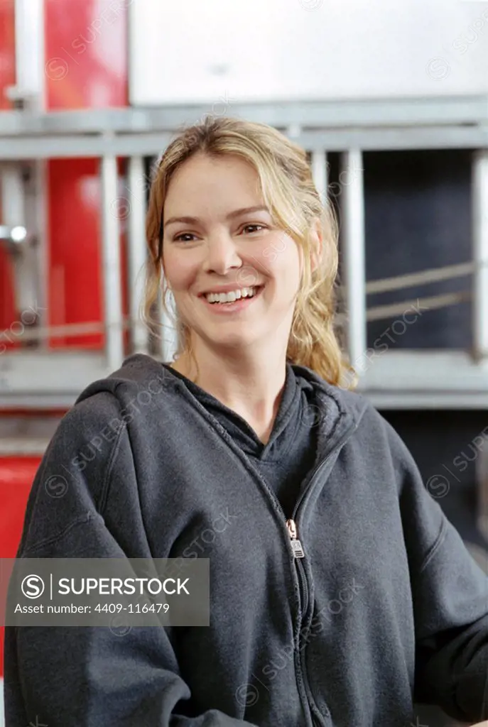 JACINDA BARRETT in LADDER 49 (2004), directed by JAY RUSSELL.