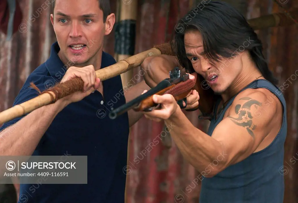 MATTHEW MARSDEN and KARL YUNE in ANACONDAS: THE HUNT FOR THE BLOOD ORCHID (2004), directed by DWIGHT H. LITTLE.
