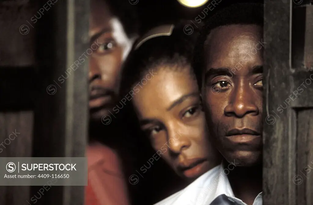 SOPHIE OKONEDO, DON CHEADLE and ANTONIO LLYONS in HÔTEL RWANDA (2004), directed by TERRY GEORGE.