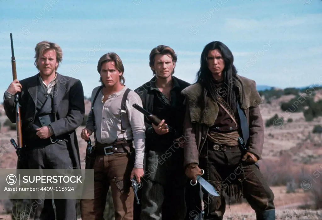 KIEFER SUTHERLAND, LOU DIAMOND PHILLIPS, EMILIO ESTEVEZ and CHRISTIAN SLATER in YOUNG GUNS II (1990), directed by GEOFF MURPHY. Copyright: Editorial use only. No merchandising or book covers. This is a publicly distributed handout. Access rights only, no license of copyright provided. Only to be reproduced in conjunction with promotion of this film.