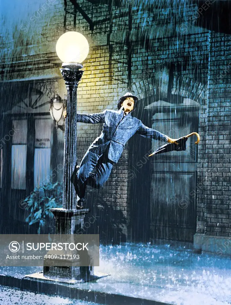GENE KELLY in SINGIN' IN THE RAIN (1952), directed by GENE KELLY and STANLEY DONEN.