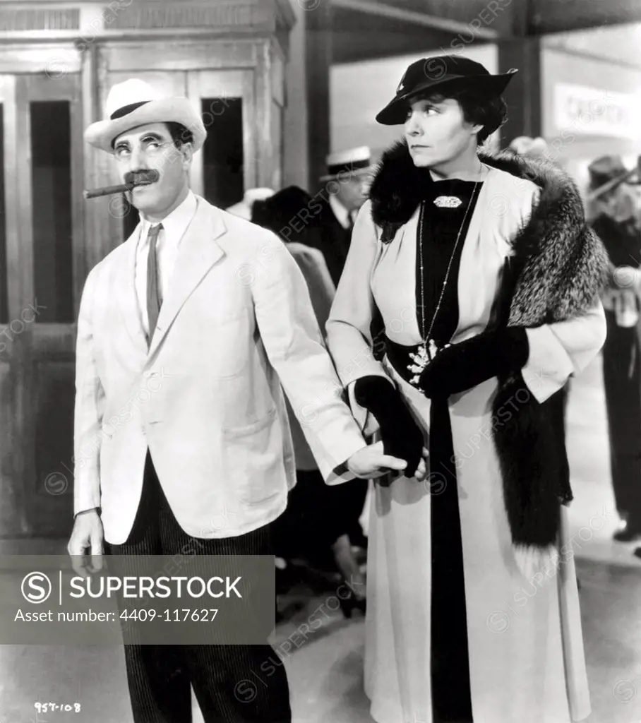 GROUCHO MARX and MARGARET DUMONT in A DAY AT THE RACES (1937), directed by SAM WOOD.