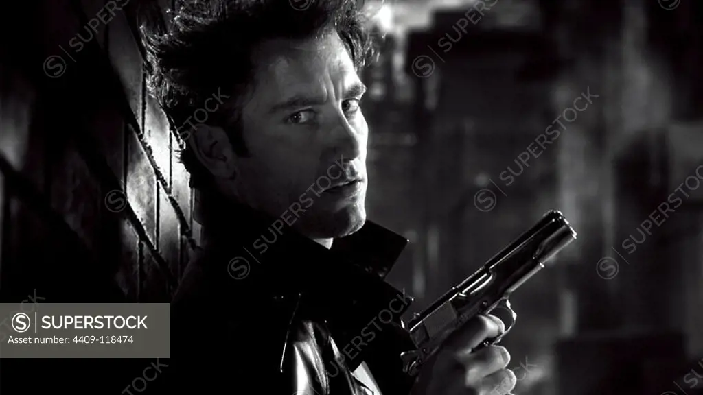 CLIVE OWEN in SIN CITY (2005), directed by ROBERT RODRIGUEZ and FRANK MILLER.