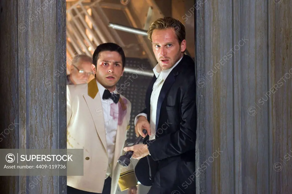 FREDDY RODRIGUEZ and JOSH LUCAS in POSEIDON (2006), directed by WOLFGANG PETERSEN.