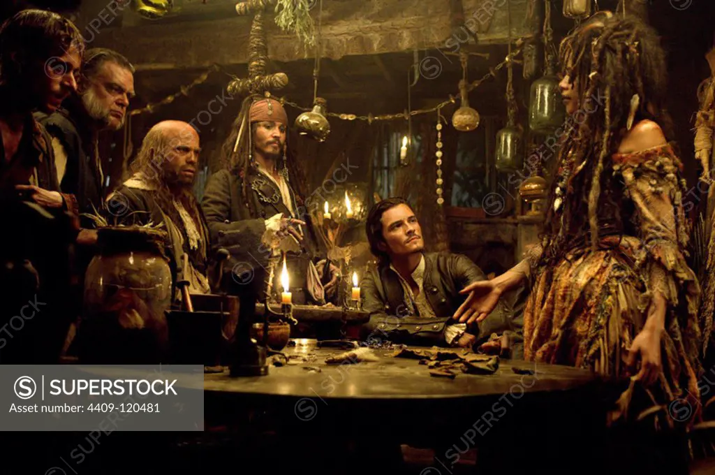 JOHNNY DEPP, ORLANDO BLOOM, MACKENZIE CROOK, NAOMIE HARRIS, KEVIN MCNALLY and LAUREN MAHER in PIRATES OF THE CARIBBEAN: DEAD MAN'S CHEST (2006), directed by GORE VERBINSKI.