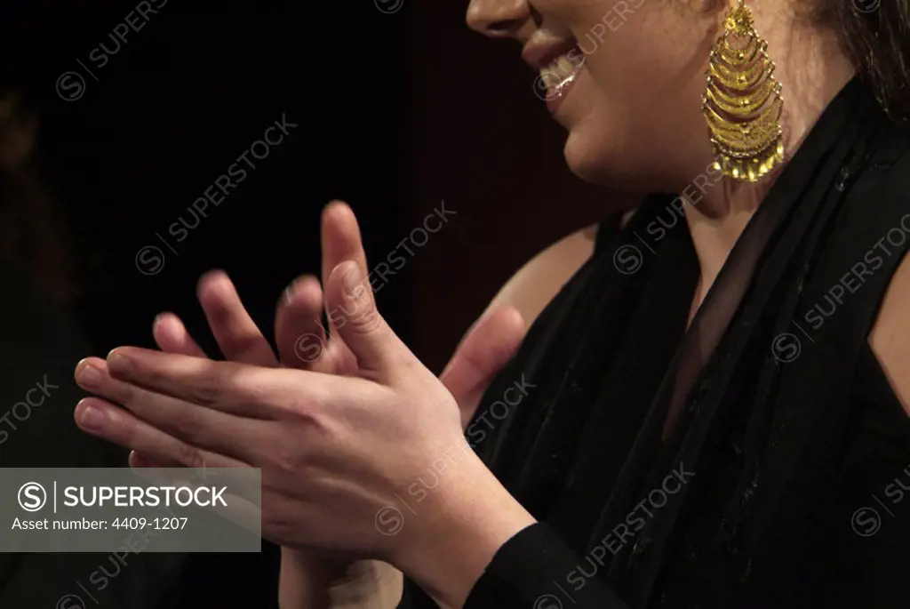 Flamenco singer clapping her hands.