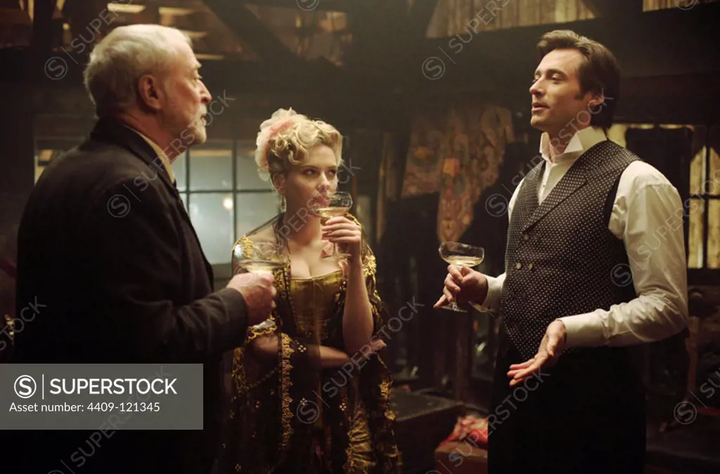 SCARLETT JOHANSSON, MICHAEL CAINE and HUGH JACKMAN in THE PRESTIGE (2006), directed by CHRISTOPHER NOLAN.