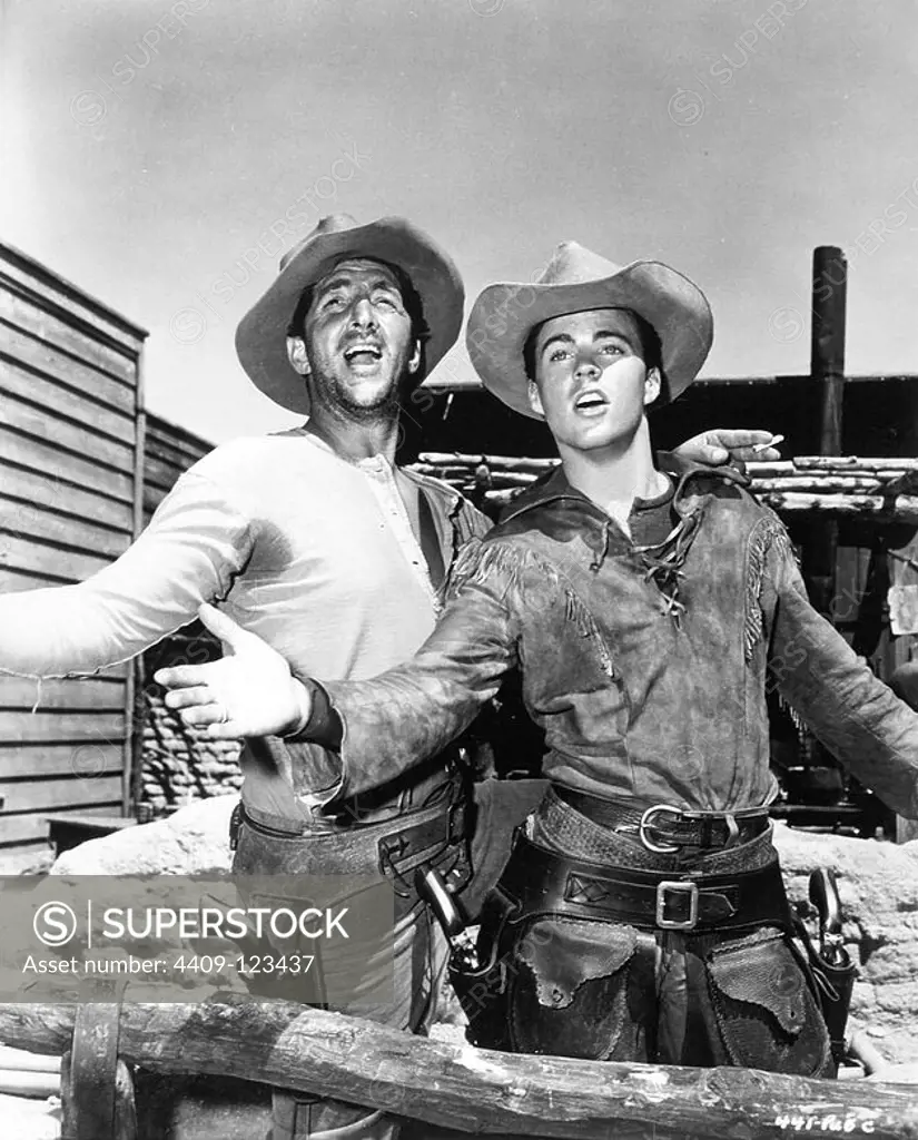 DEAN MARTIN and RICK NELSON (RICKY) in RIO BRAVO (1959), directed by HOWARD HAWKS.