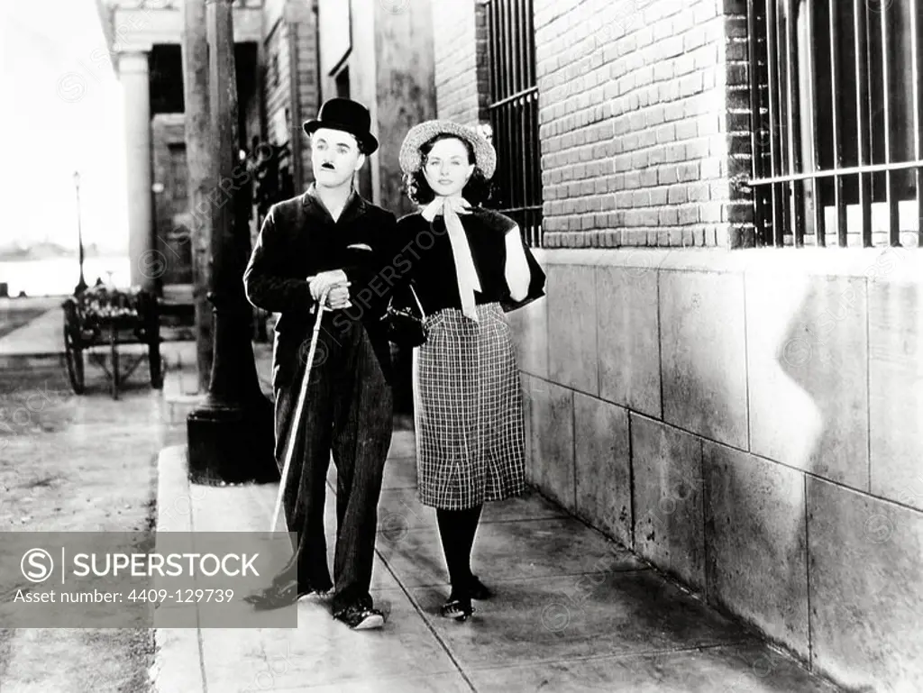 CHARLIE CHAPLIN and PAULETTE GODDARD in MODERN TIMES (1936), directed by CHARLIE CHAPLIN.