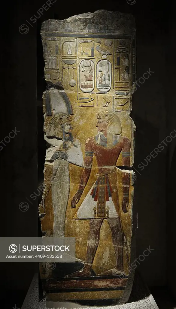 King Seti I in front of the God Osiris. Fragment of a pillar. Limestone. New Kingdom. 19th Dynasty. 1290 BC. Grave of Seti I. West Thebes. Valley of the Kings. Neues Museum. Berlin. Germany.