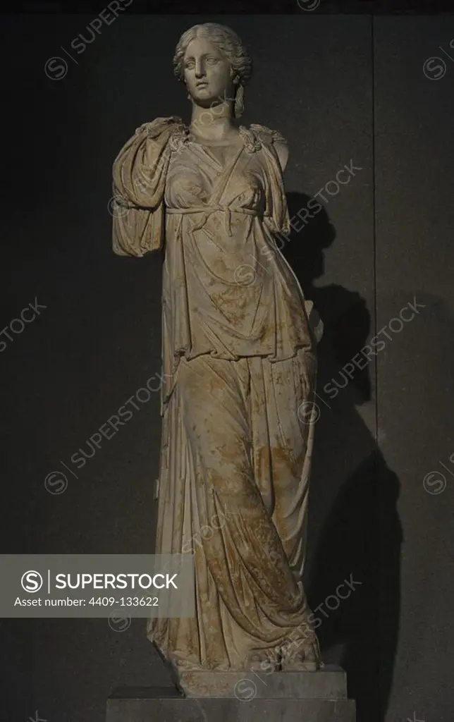 Roman colossal statue of a goddess. 138-161 AD. The head is latest. Marble. From Egypt. Neues Museum (New Museum). Berlin. Germany.