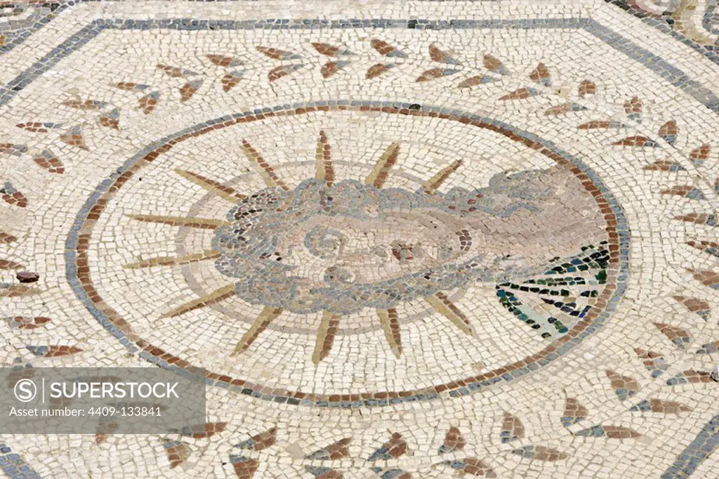 Spain, Andalusia, Seville province, Santiponce. Roman city of Italica. Founded in 206 BC by the Roman general Scipio. House of the Planetarium. Mosaic which represents the seven stars of the solar system known at that time by the Romans. Each planet is personified by a god, in turn, symbolises a day of the week. Detail of Helios or Sol, the Sun "Sol Invictus" (Sunday). The Sun is depicted wearing a crown of rays.