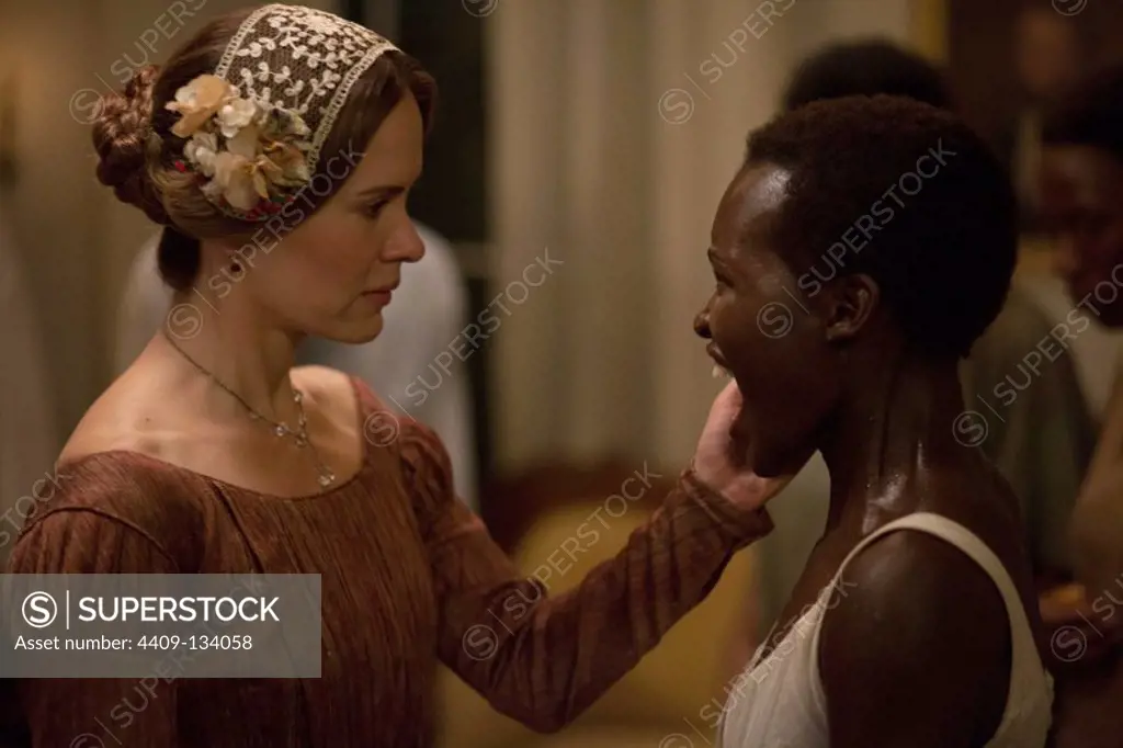 SARAH PAULSON and LUPITA NYONG'O in 12 YEARS A SLAVE (2013), directed by STEVEN R. MCQUEEN.