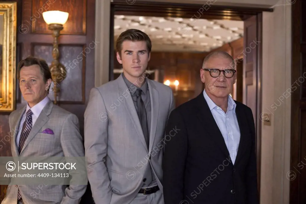 HARRISON FORD, GARY OLDMAN and LIAM HEMSWORTH in PARANOIA (2013), directed by ROBERT LUKETIC.