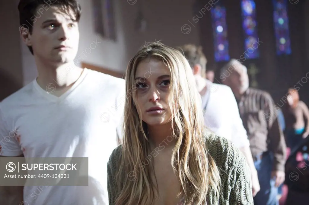 ALEXA VEGA and BRYAN DECHART in THE REMAINING (2014), directed by CASEY LA SCALA.